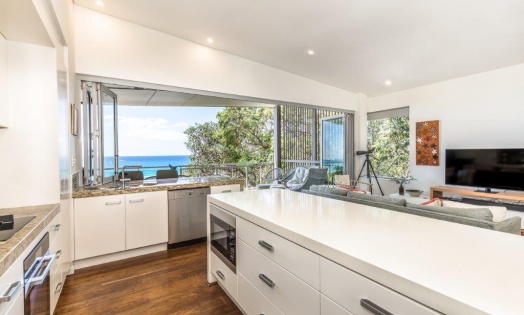 RE 0058 Unit 15 Waves Resort Dolphin Real Estate